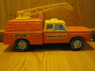 Vintage Press Metal Nylint Power And Light Co.  Orange Truck