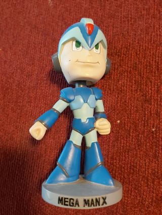 6.  5 Inches Tall Mega Man X Bobble Head Solid Has Small Scratch On Cheek