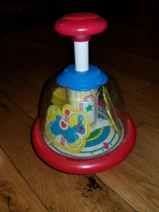 Vintage 1990 Fisher Price Pump Carousel Merry Go Round Toy Top 1052