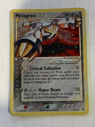 Pokemon Metagross Gold Star Ultra Rare card with plastic Pokemon sleeve 3