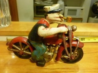 Vintage Popeye Cast Iron Rider On A Patrol Bike.
