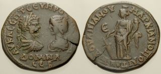 034.  Roman Bronze Coin.  Septimius Severus & Julia Domna.  Ae - 27.  Moesia.  Tyche