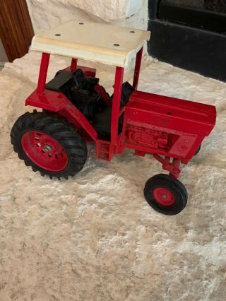 vintage red metal toy tractor.  Late 1970’s early 1980’s. 3