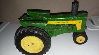 Vintage John Deere 630/730 toy tractor 3 point hitch,  fenders.  Metal cast rims 2