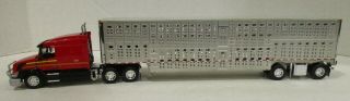 1/64 Dcp Diecast Promotion Red Volvo Vnl 670 Cow Catcher With Cattle Trailer