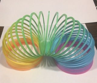 Magic Spring Slinky Bouncy Plastic Rainbow Spring Colorful Children Funny Toy