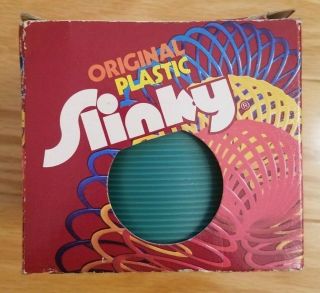 Teal Plastic Slinky - Vintage,  1980s Blue Green