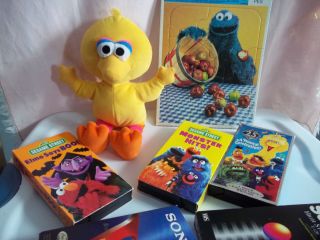 7 Sesame Street,  Big Bird Soft Toy,  Cookie Puzzle & 5 Vhs [ ]