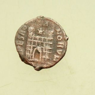 Magnus Maximus.  A.  D.  383 - 388.  AE 13 mm,  1.  g,  Rome SPES RO - MA - NORVM,  camp gate 2