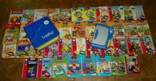Leap Pad Plus Writing Learning Systems,  41 Books & Cartridges W/ Carrying Case