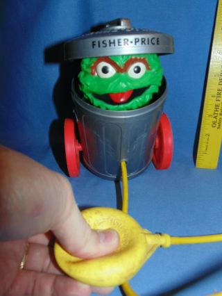Fisher Price Sesame Street Oscar the Grouch Trash Can pull toy - vintage 2