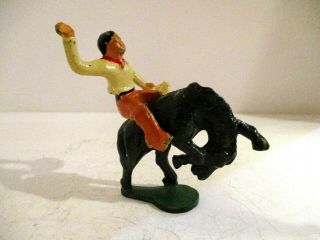 Grey Iron Vintage,  Hard To Find,  Toy Cow Boy With Bucking Broncho