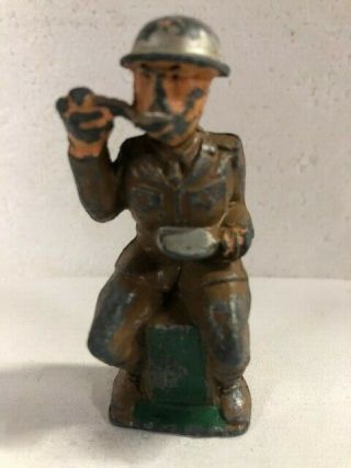 Vintage Manoil M84 Soldier Sitting Eating Grey Iron Barclay Toy Military Army