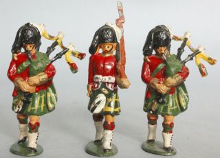 Timpo Lead Marching Scots Guard Bagpiper & Marching Figures