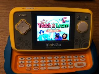 Vtech Mobigo Touch Learning System With 4 Games,  Protective Case,  Car Charger