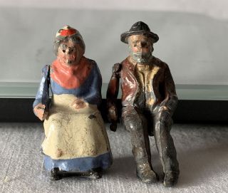 2 Seated Britains Era Painted Lead Old Man W Pipe & Woman Articulating Arms Toys