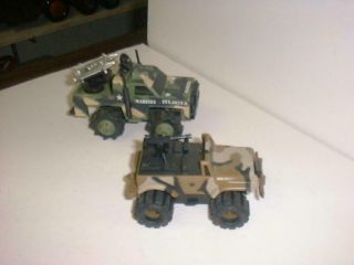 Stomper 4x4 Army Jeep And A Rough Rider Jeep 4x4 With Missiles /