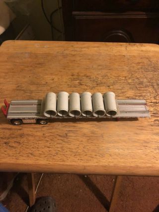 1/64 Diecast Flat Bed Trailer With Load.  Dcp?