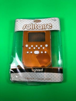 Radica Lighted Classic Solitaire Handheld Electronic Video Game Orange