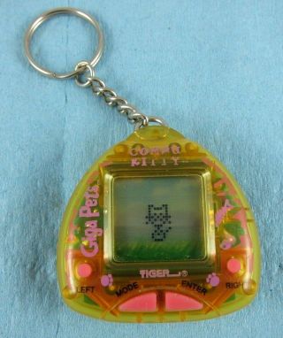 Giga Pet Compu Kitty Virtual Pet 1997 Tiger Electronics Keychain -
