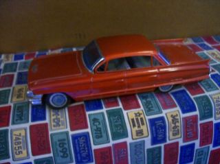Bandai 1961 Cadillac Friction Tin Car