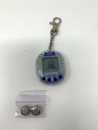Nano Baby Electronic Virtual Pet Keychain Transparent/blue Playmates 1997