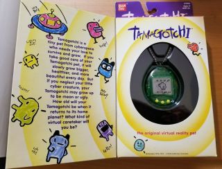 1997 Bandai Tamagotchi Virtual Pet W/ Box Instructions Green