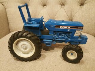 Vintage 1986 Ertl 1/16 Scale Diecast Ford 7710 Blue Farm Tractor With Rollbar