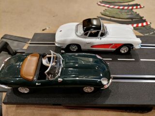 Carerra 1/24.  Exclusiv 20486 - 1962 Chevy Corvette And 20485 Jaguar Xke Slotcars