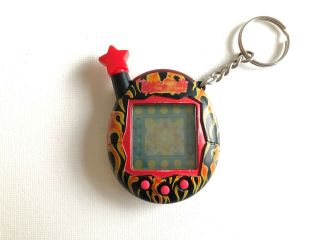 Tamagotchi Connection V4.  5 Black And Red Flames Shell 2007