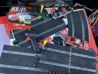 SCX 1:32 NASCAR Tri - Oval Speedway Slot Car Set Kevin Harvick/Kasey Kahne 2