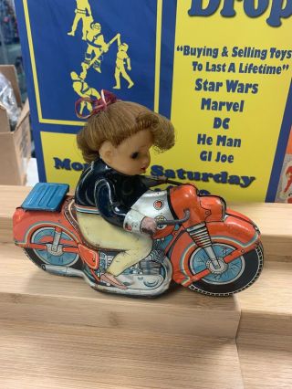 Vintage Haji Japan Tin Litho Friction Girl Riding Motorcycle Biker Toy