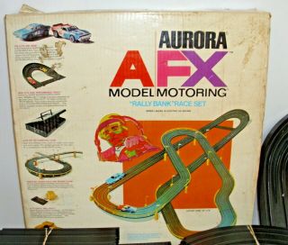 Aurora Afx Model Motoring Rally Bank Ho Slot Car Set With Cars Boxed