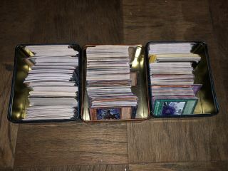 yugioh cards over 1000 random yugioh cards - 3 collector tins full 3