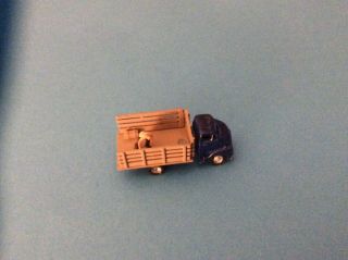 Unbranded N Scale 1 Work Truck.  There Is Also A Man And Supplies