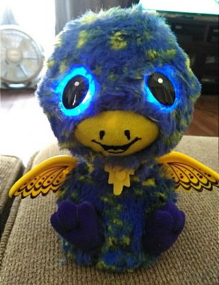 Hatchimals.  Blue.  Eyes light up and change colors. 2
