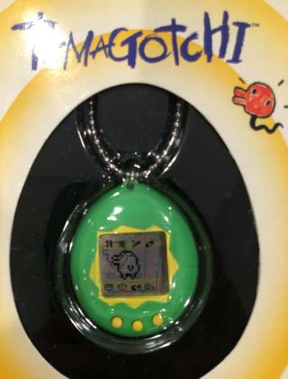 Tamagotchi 1800 Bandai 1996 1997,  Green & Yellow