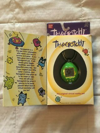 1996 1997 Bandai Tamagotchi Virtual Pet Green Yellow Buttons 1800