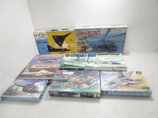 8 Model Kits Assorted Scale Some Planes,  Helicopters,  German,  E - Boat
