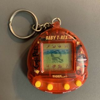 Giga Pets Baby T - Rex Jurassic Park Tiger Electronic Keychain 1997 - Great