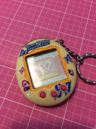 Tamagotchi Connection V2 (Yellow,  Butterfly Shell,  Instructions) 2
