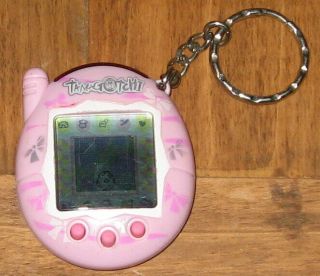 2004 Tamagotchi Connection Virtual Pet Version Bandai Pink Bow Ties Wear