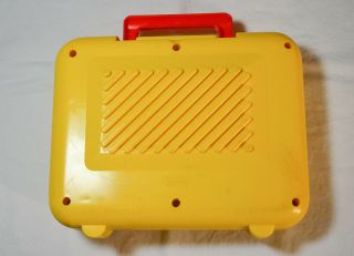 1990 Shelcore Musical Windup TV Radio with Moving Screen Yellow 2