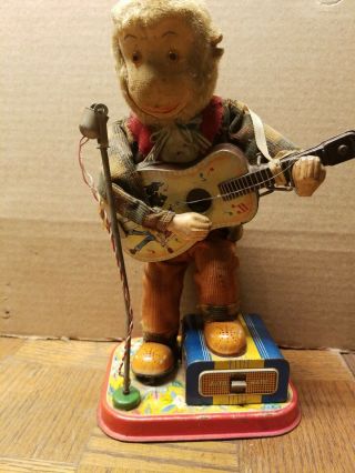 Vintage Made In Japan Battery Operated Signing Monkey Tin Toy