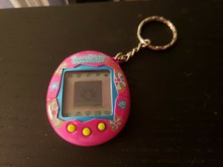 Tamagotchi Connection V2 2004 Pink / Purple White Flowers & Shell - Battery