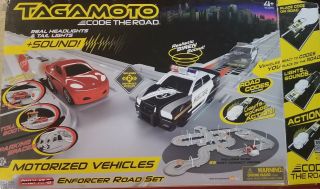 Tagamoto Motorizer Vehicles 44 Pc Of Track 2 Cars And A Bunch Of Signs