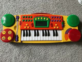 Sing - Along Electronic 25 - Key Magic Keyboard In Concert For Children