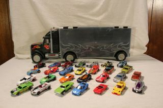 28 Assorted Hot Wheels Cars With Semi Truck Display Carrying Case