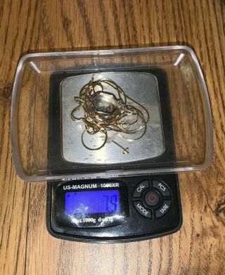 7.  9 Grams Of 14k Gold Scrap Jewelry