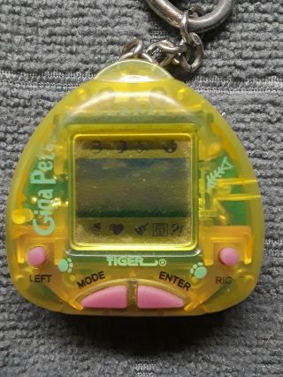 Giga Pet Compu Kitty Vintage 1997 and another game.  NOT.  Chain. 2